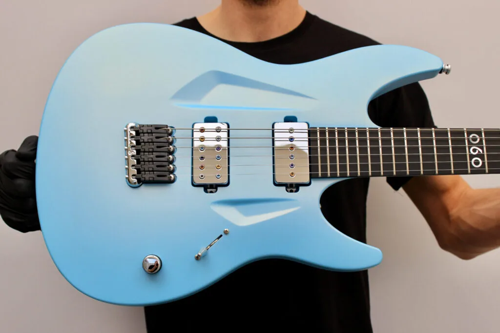 060 Light Blue Pearl Satin | Aristides Guitars