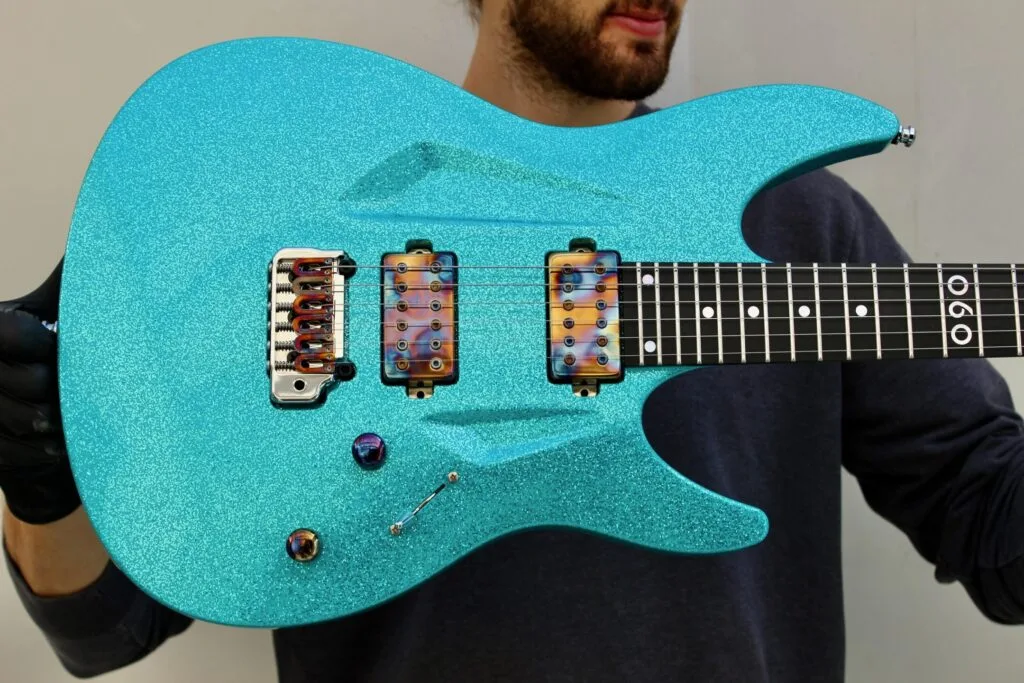 060 Aqua Green Sparkle | Aristides Guitars