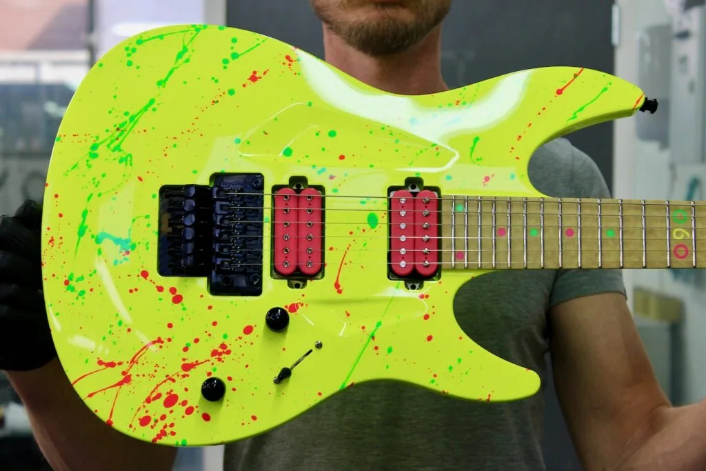 060 Neon Yellow with Multi Neon Splatter Gloss | Aristides Guitars