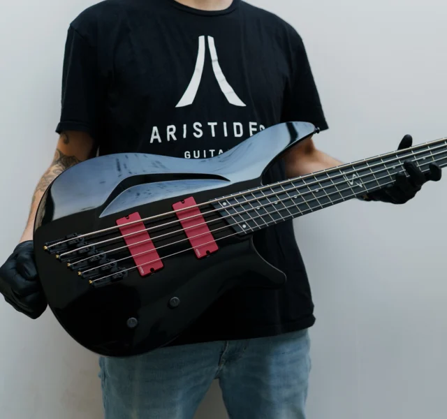 Aristides S/B5 Black Gloss loaded with red @emgpickups !