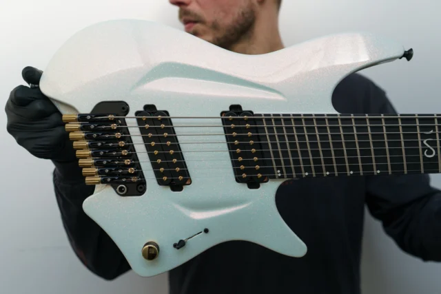 Aristides H/08 Arctic Sunset Sparkle equipped with @lundgrenguitarpickups M8s with gold screw and a tremolo in hybrid colour hardware!! Also features a Sureclaw and ENGL Hardtailer!