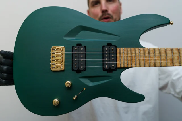 Aristides 060R Emerald Green featuring the Seymour Duncan Pegasus/Sentient pickups and a scalloped fretboard!