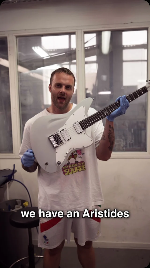 Build of the Week Aristides STX6R Light Gray featuring a Rainbow Sparkle over white pickguard, @bareknucklepickupsofficial Halcyons in white, and a chrome @evertune