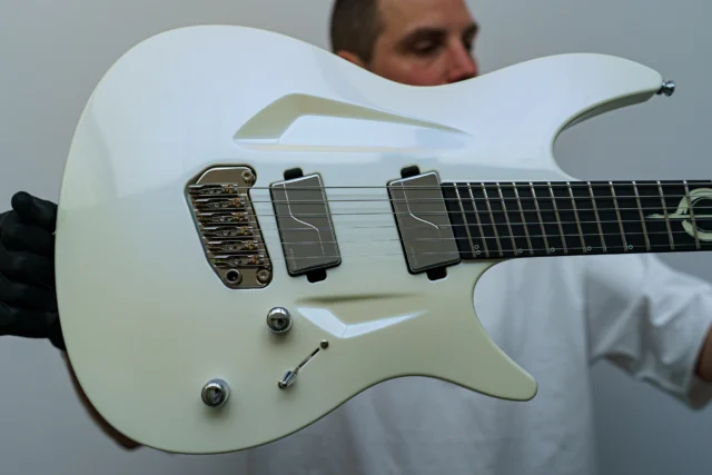 Aristides 060S Iridescent Pearl Custom featuring @fishmanmusic Tosin Abasi set in Chrome with our multiscale tremolo and an epic fretboard inlay!