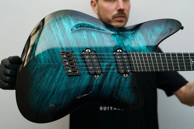 Aristides STX6S Dark Teal Flame Marble Gloss Burst equipped with a custom set of @bareknucklepickupsofficial 🤘