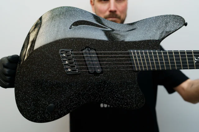 Aristides STX6S Galactic Sparkle with one @bareknucklepickupsofficial Polymath!