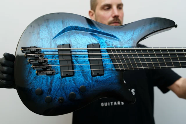 Aristides S/B5 Blue Marble Burst Gloss equipped with @fishmanmusic Fluence Bass pickups!