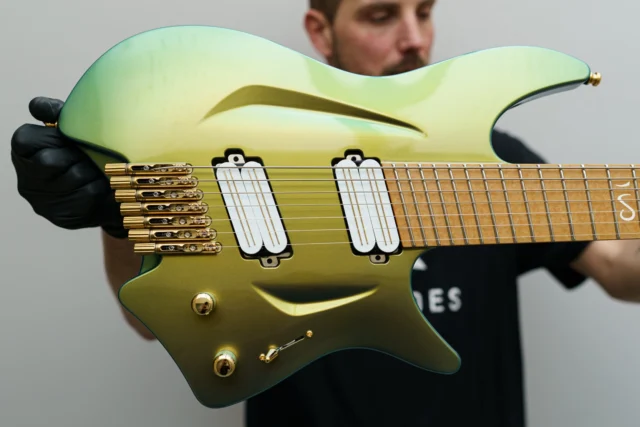 Aristides H/07 Blue/Green Chameleon loaded with @bareknucklepickupsofficial Impulses in white bobbins!