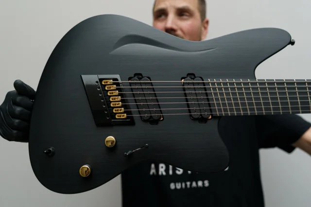 Aristides STX7SR Black loaded with @lundgrenguitarpickups M7 + Black Heaven in the neck pickup position with hybrid hardware and a multiscale @evertune
