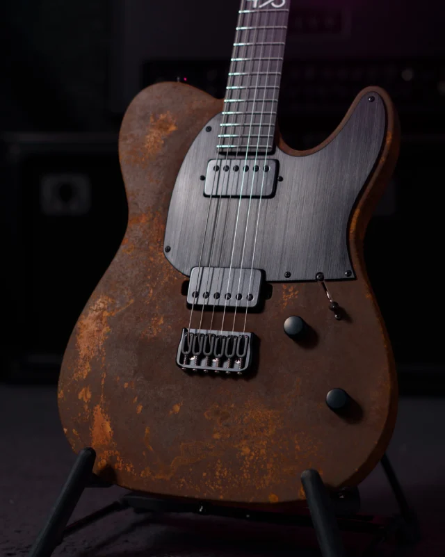 Aristides T/0 Martian Rust equipped with a black raw pickguard and @bareknucklepickupsofficial Painkillers in a matching covered black set!